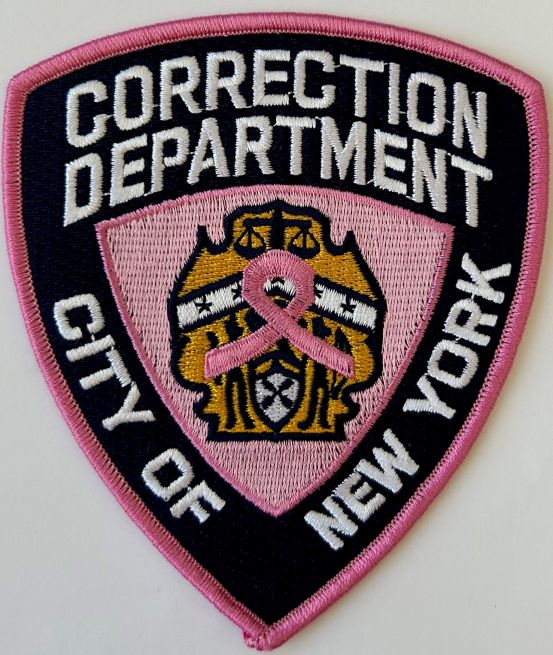 CITY OF NEW YORK DEPARTMENT OF CORRECTIONS PINK SHOULDER PATCH - SEW ON.